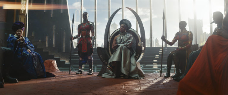 (L-R): Dorothy Steel as Merchant Tribe Elder, Florence Kasumba as Ayo, Angela Bassett as Ramonda, Danai Gurira as Okoye in Marvel Studios' Black Panther: Wakanda Forever. Photo courtesy of Marvel Studios. © 2022 MARVEL.
