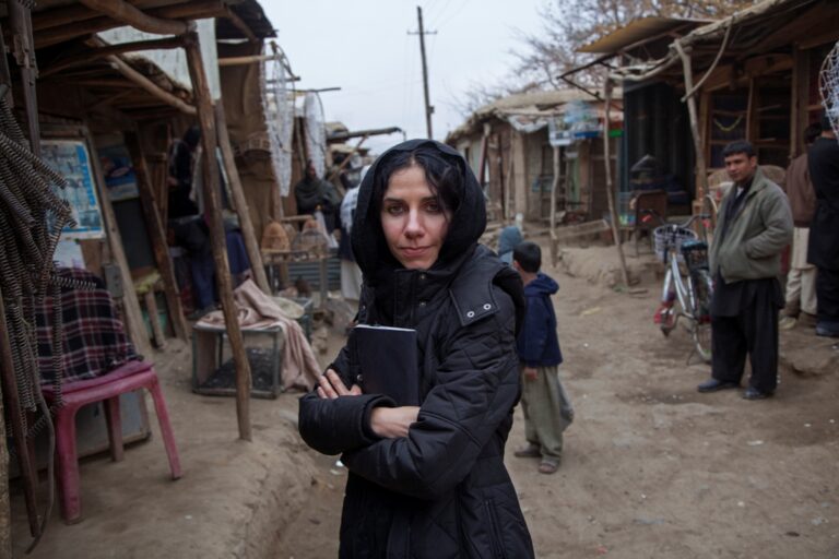 PJ Harvey as featured in Seamus Murphy's film "A Dog Called Money". His feature documentary on their collaboration traces the sources of the songs that were inspired by their travels, and tells stories of the some of the people and places they encounted along the way.