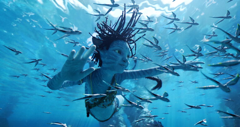 Tuk (Trinity Bliss) in 20th Century Studios' AVATAR: THE WAY OF WATER. Photo courtesy of 20th Century Studios. © 2022 20th Century Studios. All Rights Reserved.