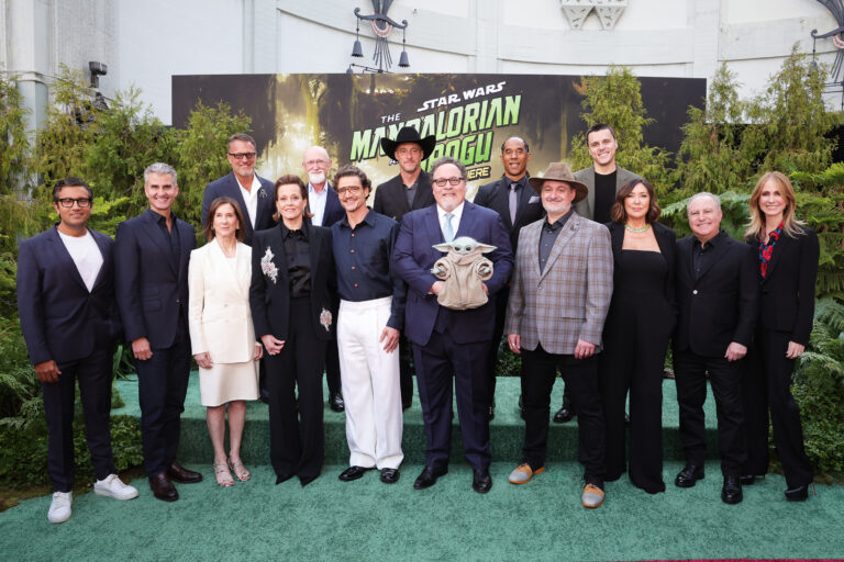 (L-R) Asad Ayaz, Chief Marketing and Brand Officer, The Walt Disney Company, Josh D'Amaro, Chief Executive Officer, The Walt Disney Company, Kathleen Kennedy, President, Lucasfilm, Steve Blum, Sigourney Weaver, Ian Bryce, Pedro Pascal, Brendan Wayne, Jon Favreau, Lateef Crowder, Dave Filoni, President & CCO, Lucasfilm, Noah Kloor, Lynwen Brennan, Alan Bergman, Chairman, Disney Entertainment and Dana Walden, President and Chief Creative Officer, The Walt Disney Company, attend The Mandalorian and Grogu Los Angeles World Premiere in Los Angeles, California on May 14, 2026.. (Frank Micolleta for Disney)